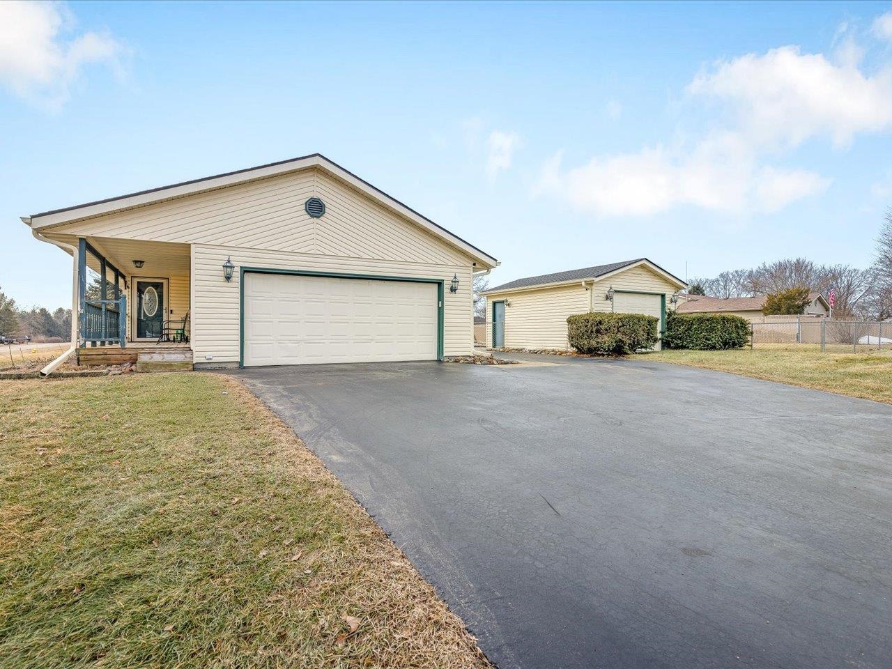 11818 Balsa Lane Roscoe, IL 61073 - Photo 6 of 44 a view of an house with backyard and trees