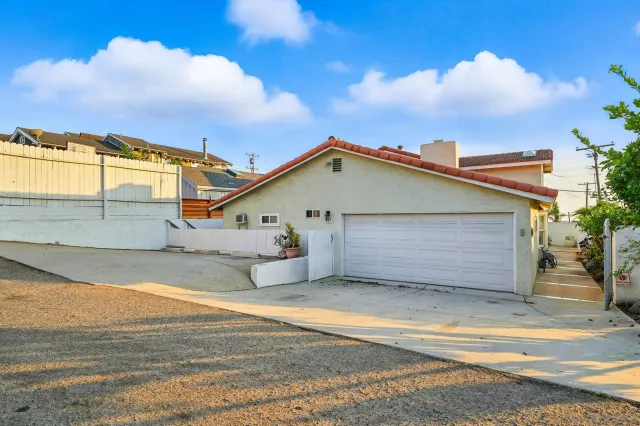 front view of a house with a garage