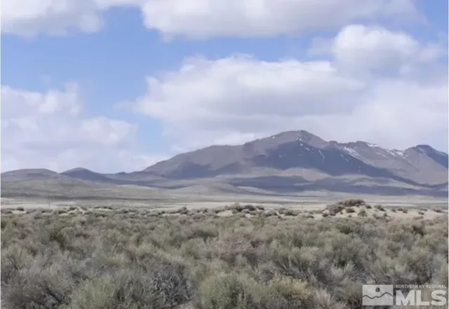 a view of mountains and valleys