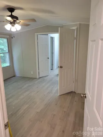 a bathroom with a toilet and a bathtub