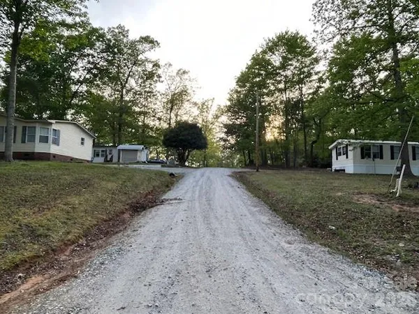 a view of a outdoor space with deck and yard