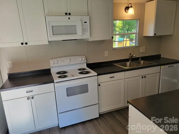 a bathroom with a toilet and a bathtub