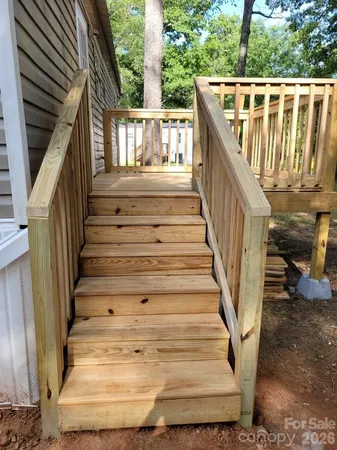 a house view with a backyard space
