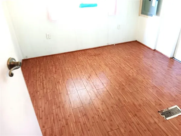 a view of a swimming pool with chair and tables