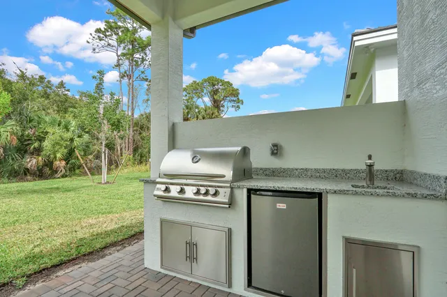 a kitchen with a stove and a microwave oven