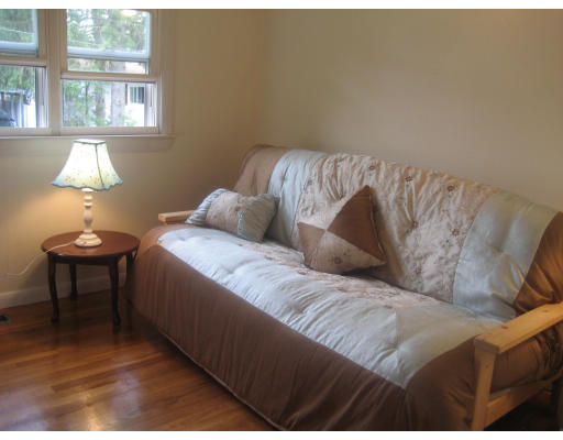 6 Belnap Road Boston, MA 02136 - Photo 12 of 14 a living room with a couch