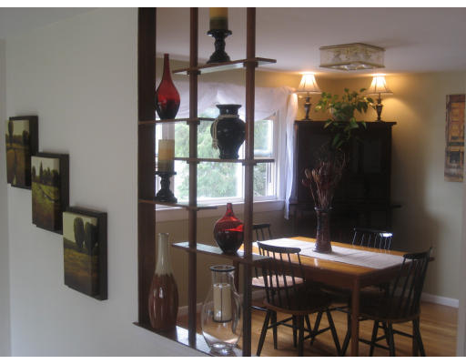 6 Belnap Road Boston, MA 02136 - Photo 3 of 14 a dining room with table and chairs