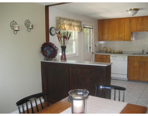 6 Belnap Road Boston, MA 02136 - Photo 4 of 14 a kitchen with a sink and a stove
