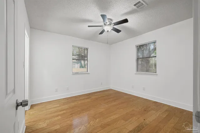 a fire hydrant in the middle of a field