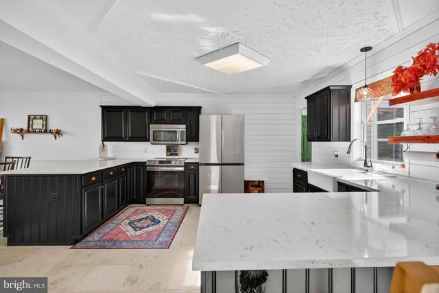 a room with furniture and a wooden floor