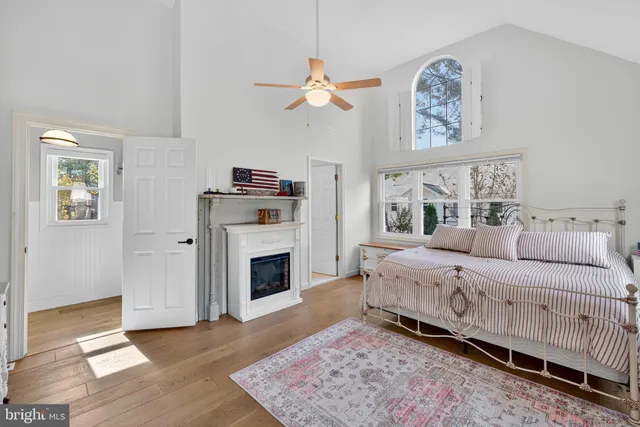 a view of an empty room and wooden floor