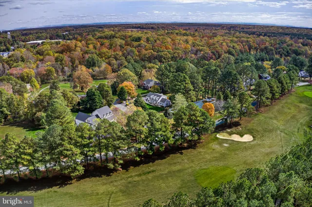 a view of a lake with a building in the background