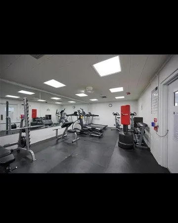 a view of a room with gym equipment