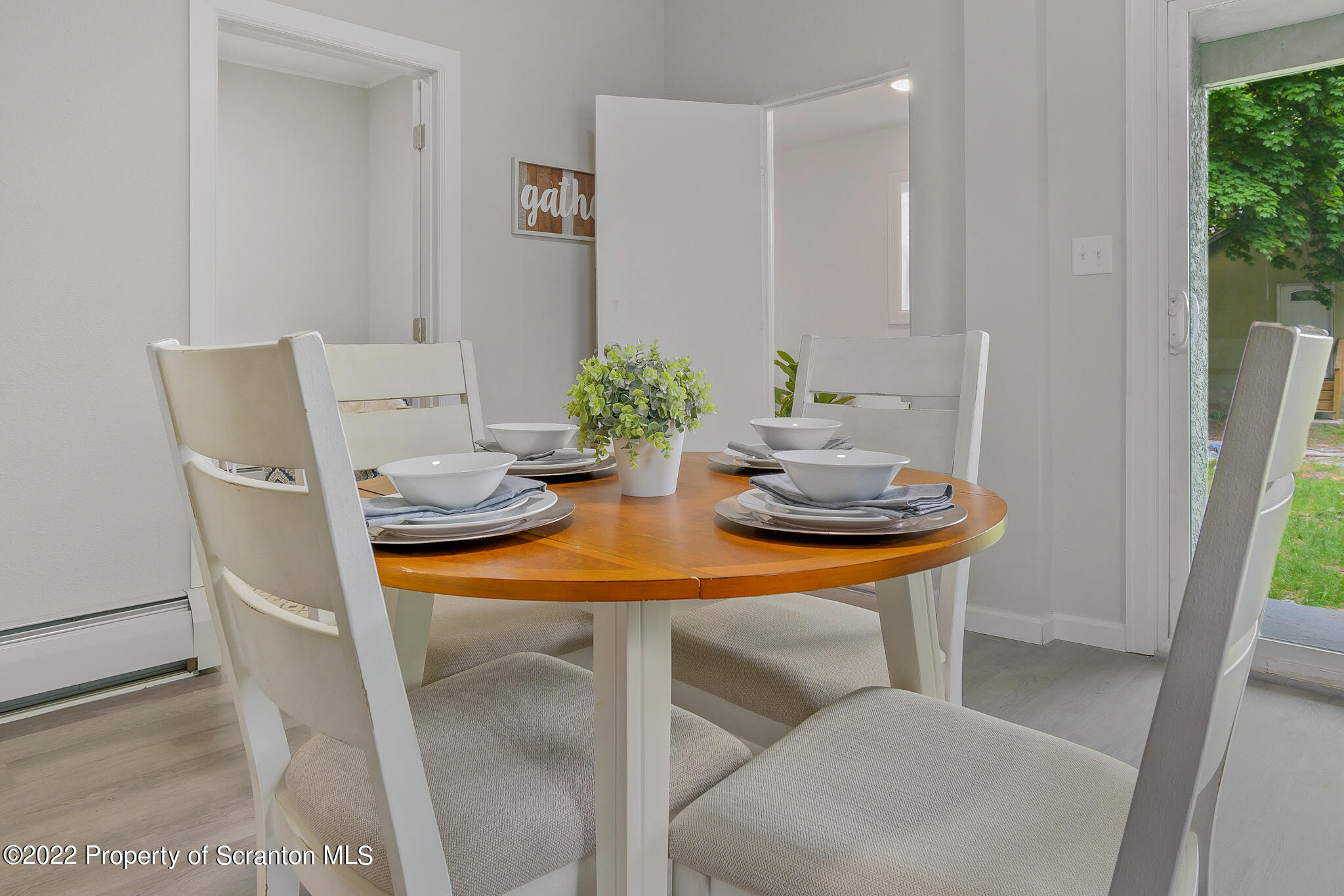 533 Cherry Street Scranton, PA 18505 - Photo 13 of 33 a dining room with furniture and wooden floor