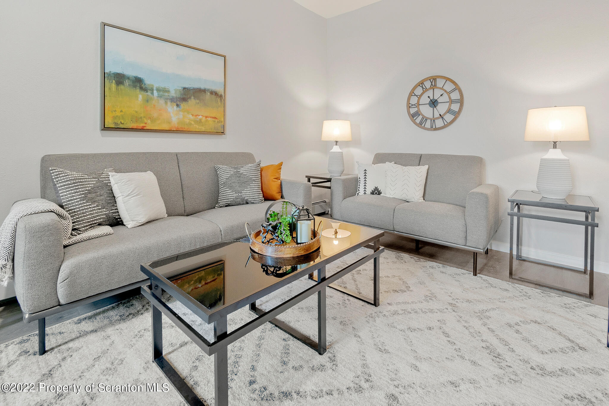 533 Cherry Street Scranton, PA 18505 - Photo 2 of 33 a living room with furniture and a lamp