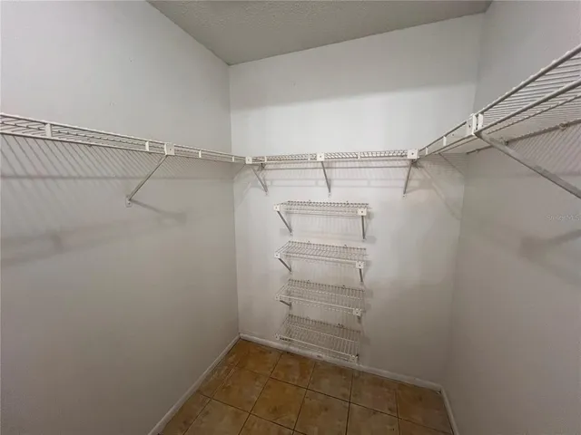 a view of a room with racks on the wall