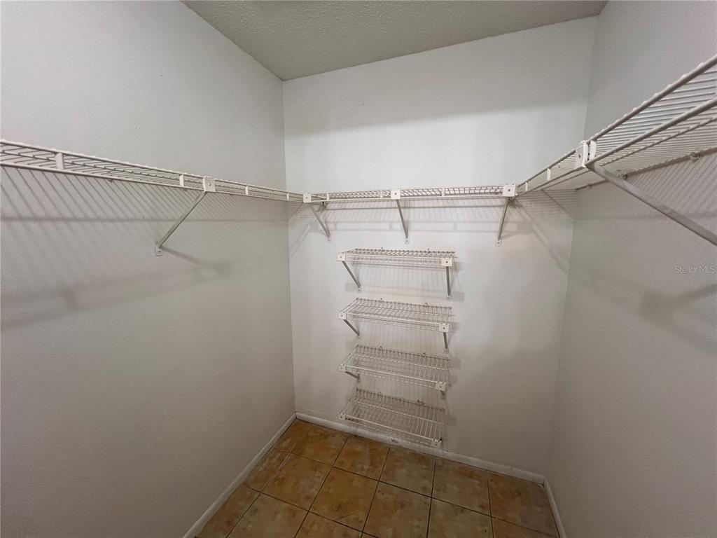 7771 Country Place, Unit 7 Winter Park, FL 32792 - Photo 8 of 15 a view of a room with racks on the wall