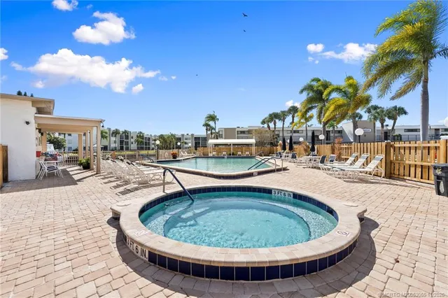 a view of a swimming pool from a balcony