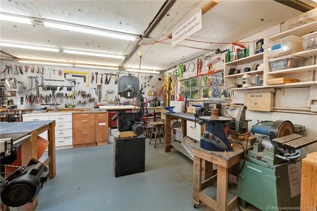 a room with wooden cabinets and furniture