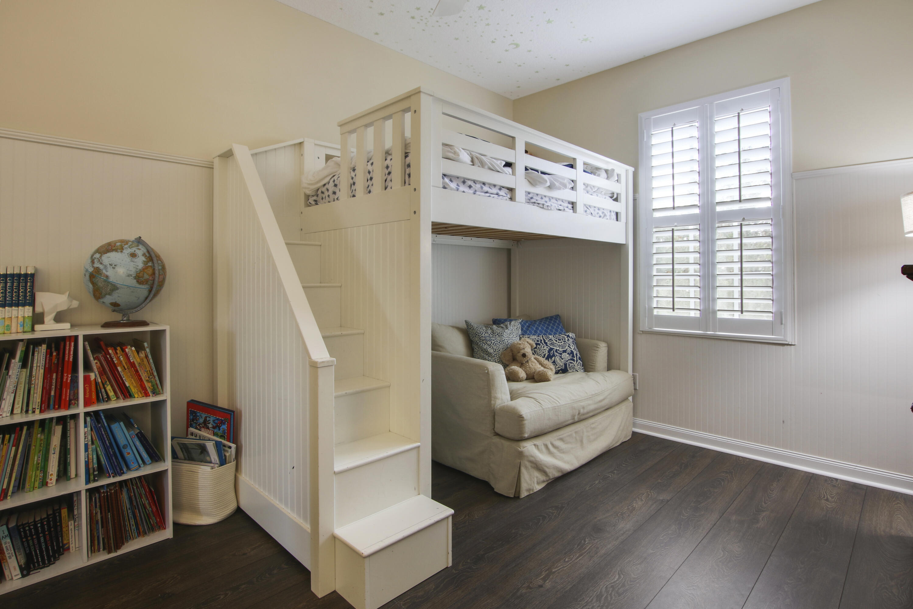 153 Andover Drive Jupiter, FL 33458 - Photo 18 of 25 a living room with furniture and a book shelf