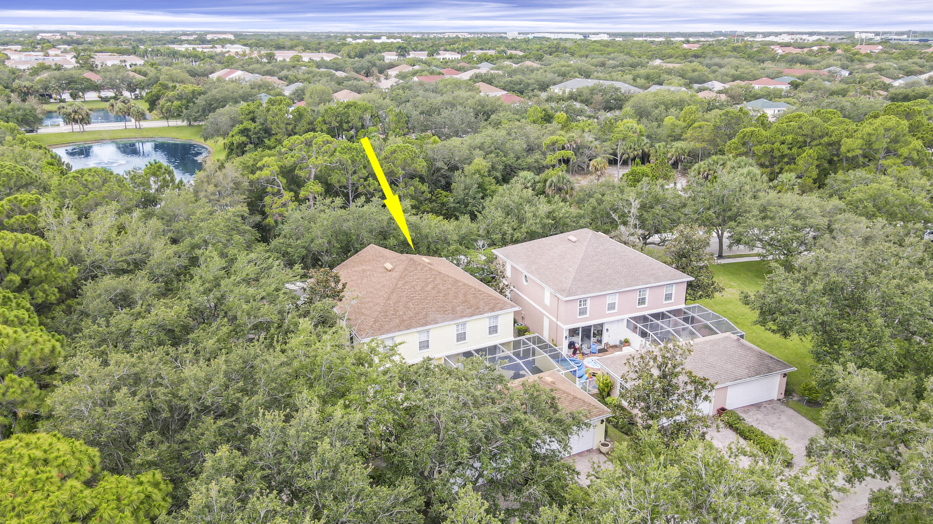 153 Andover Drive Jupiter, FL 33458 - Photo 2 of 25 an aerial view of residential houses with outdoor space and street view