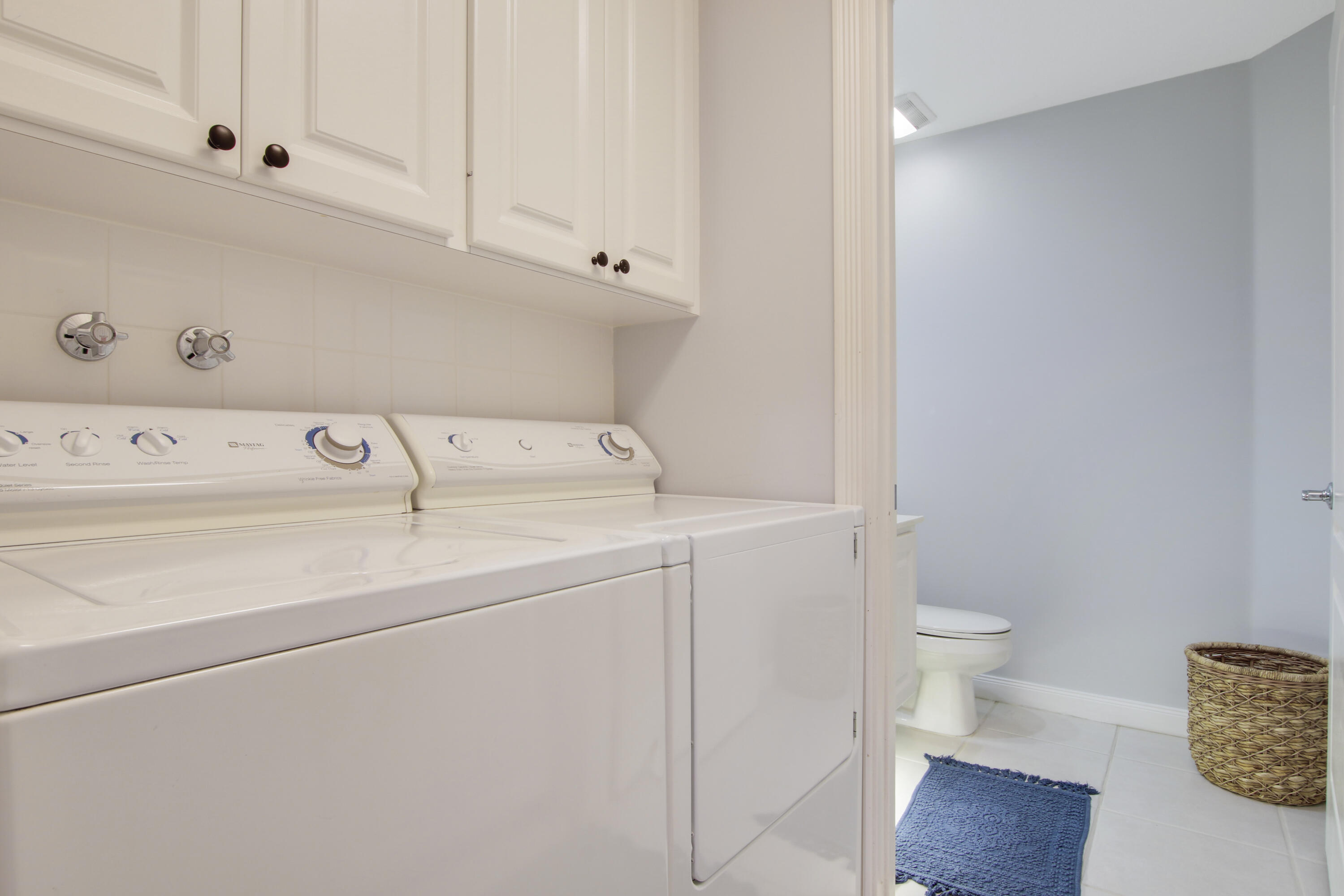 153 Andover Drive Jupiter, FL 33458 - Photo 22 of 25 a utility room with dryer and washer