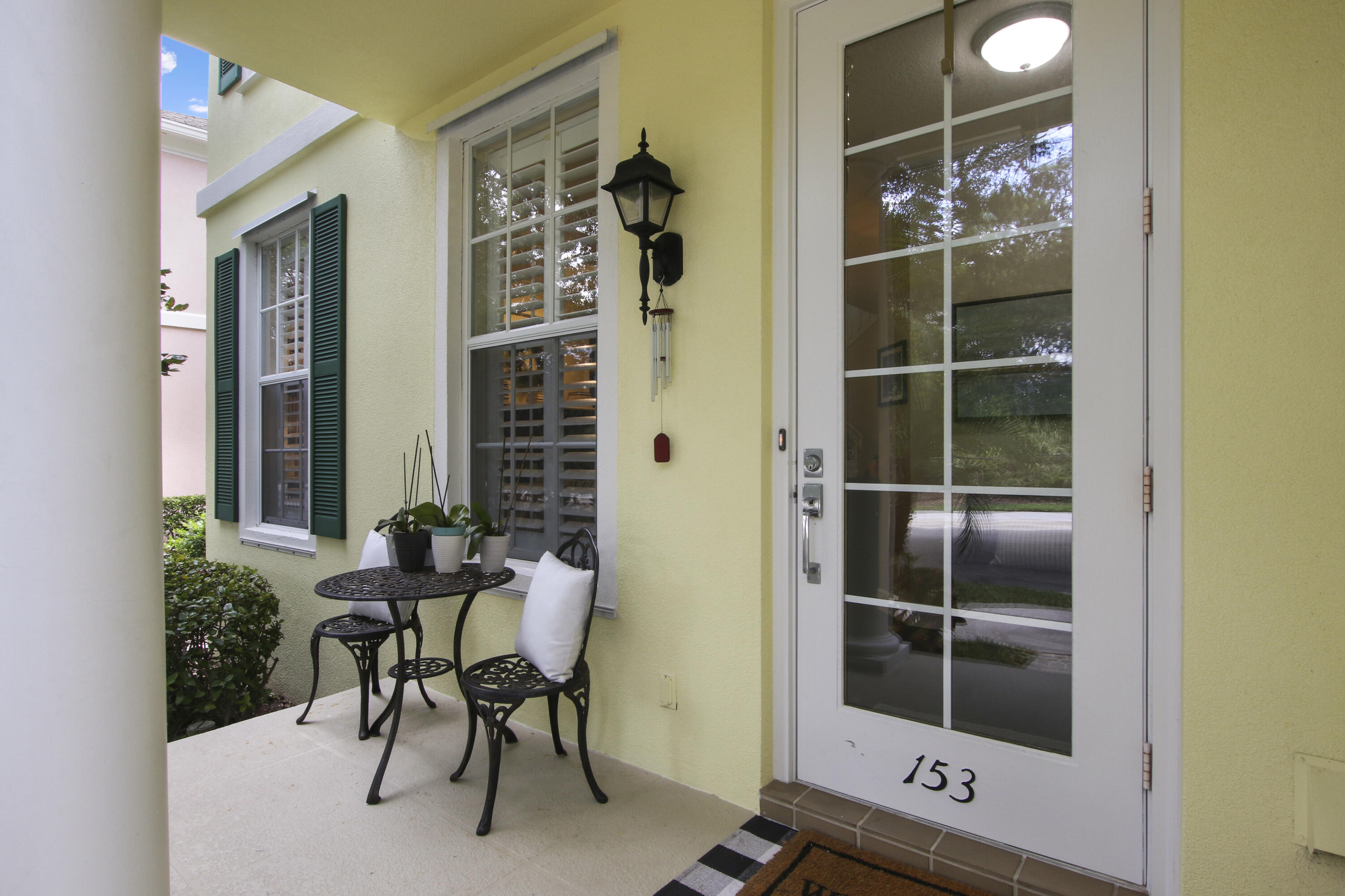 153 Andover Drive Jupiter, FL 33458 - Photo 6 of 25 a room with a table and chairs