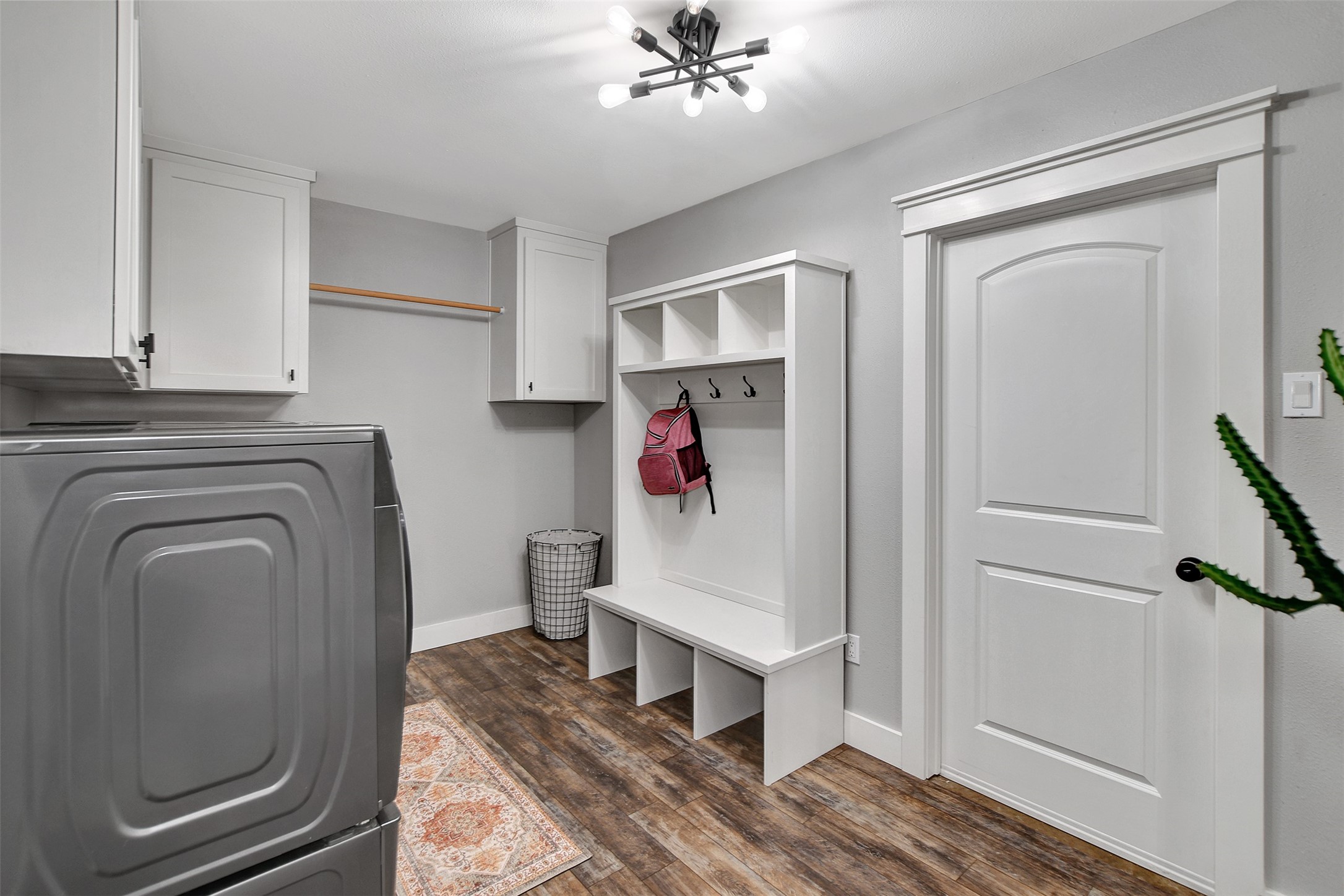 205 Munz Street Brenham, TX 77833 - Photo 26 of 48 a hallway with washer and dryer