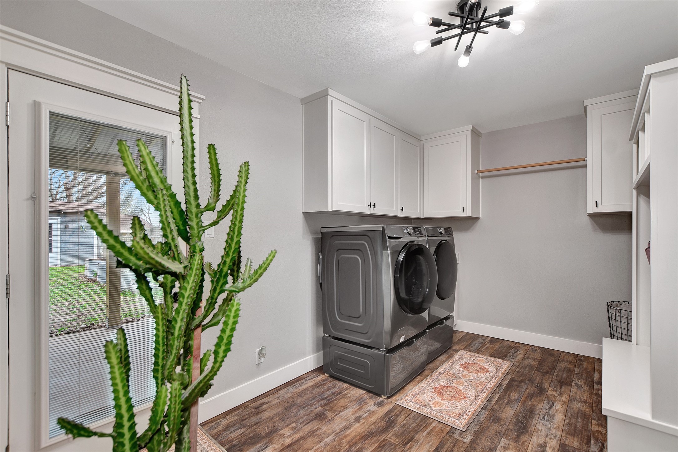 205 Munz Street Brenham, TX 77833 - Photo 27 of 48 a view of a hallway with washer and dryer