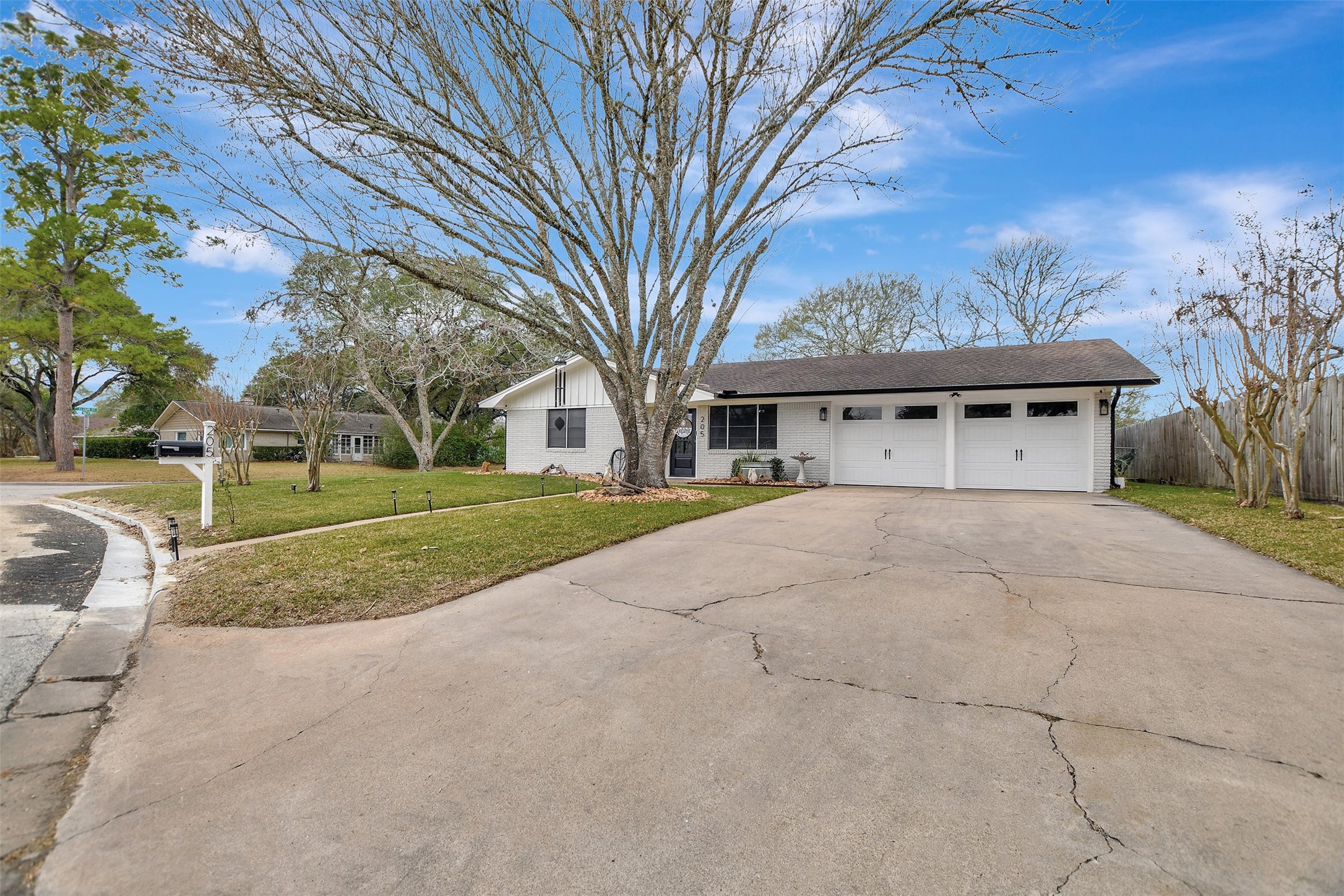 205 Munz Street Brenham, TX 77833 - Photo 3 of 48 a view of house with outdoor space and parking