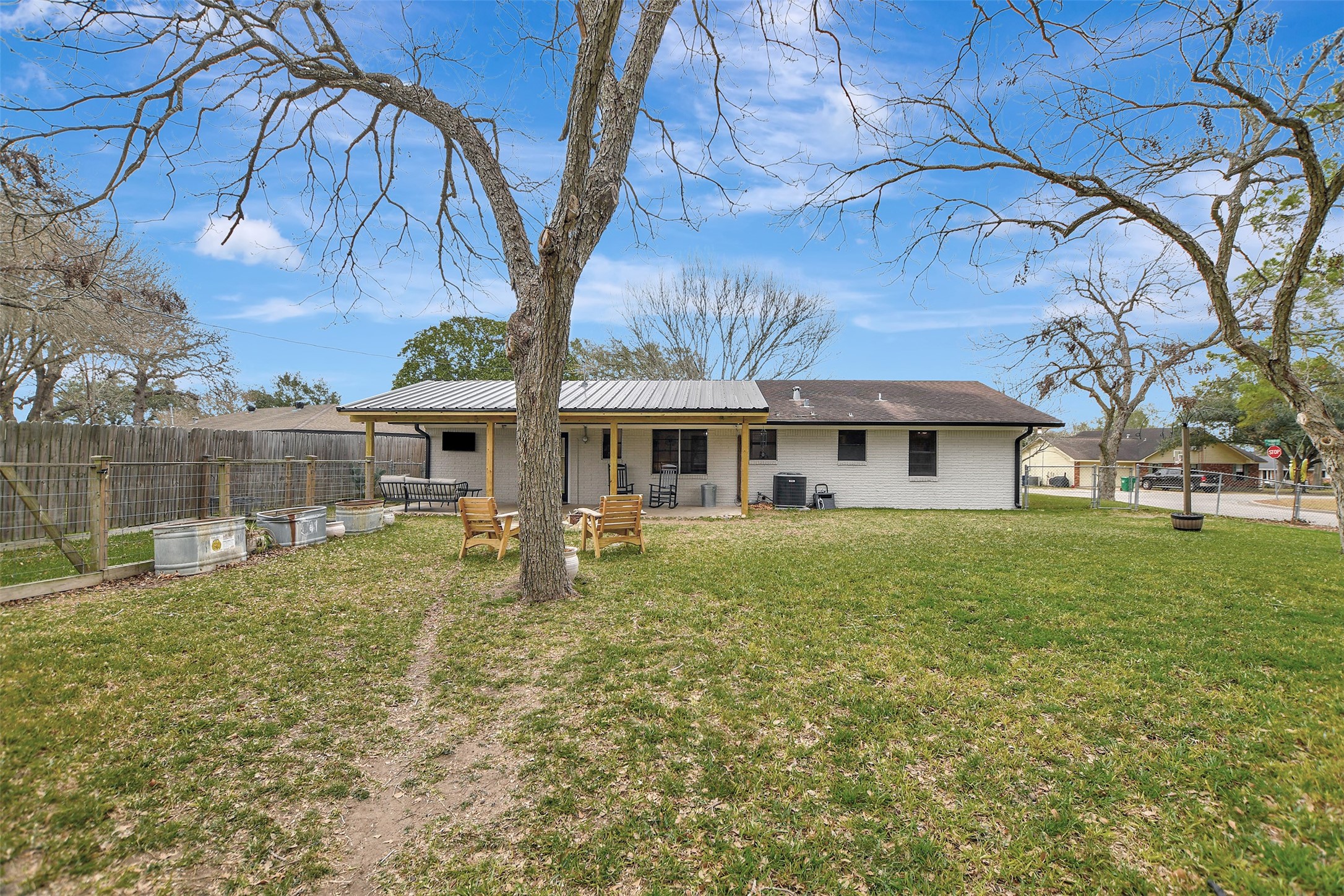 205 Munz Street Brenham, TX 77833 - Photo 33 of 48 a front view of house with yard and seating area