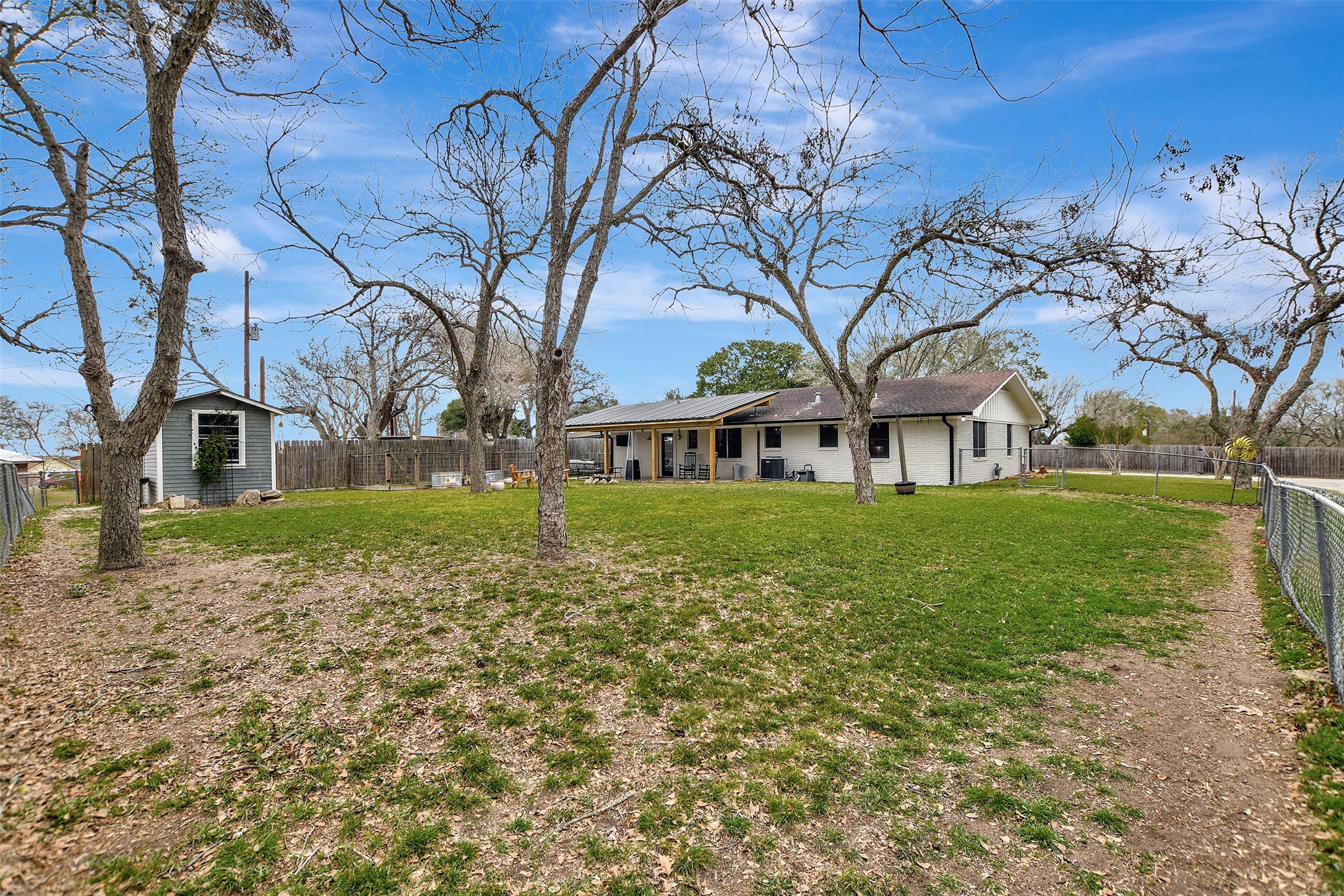 205 Munz Street Brenham, TX 77833 - Photo 34 of 48 a front view of a house with garden