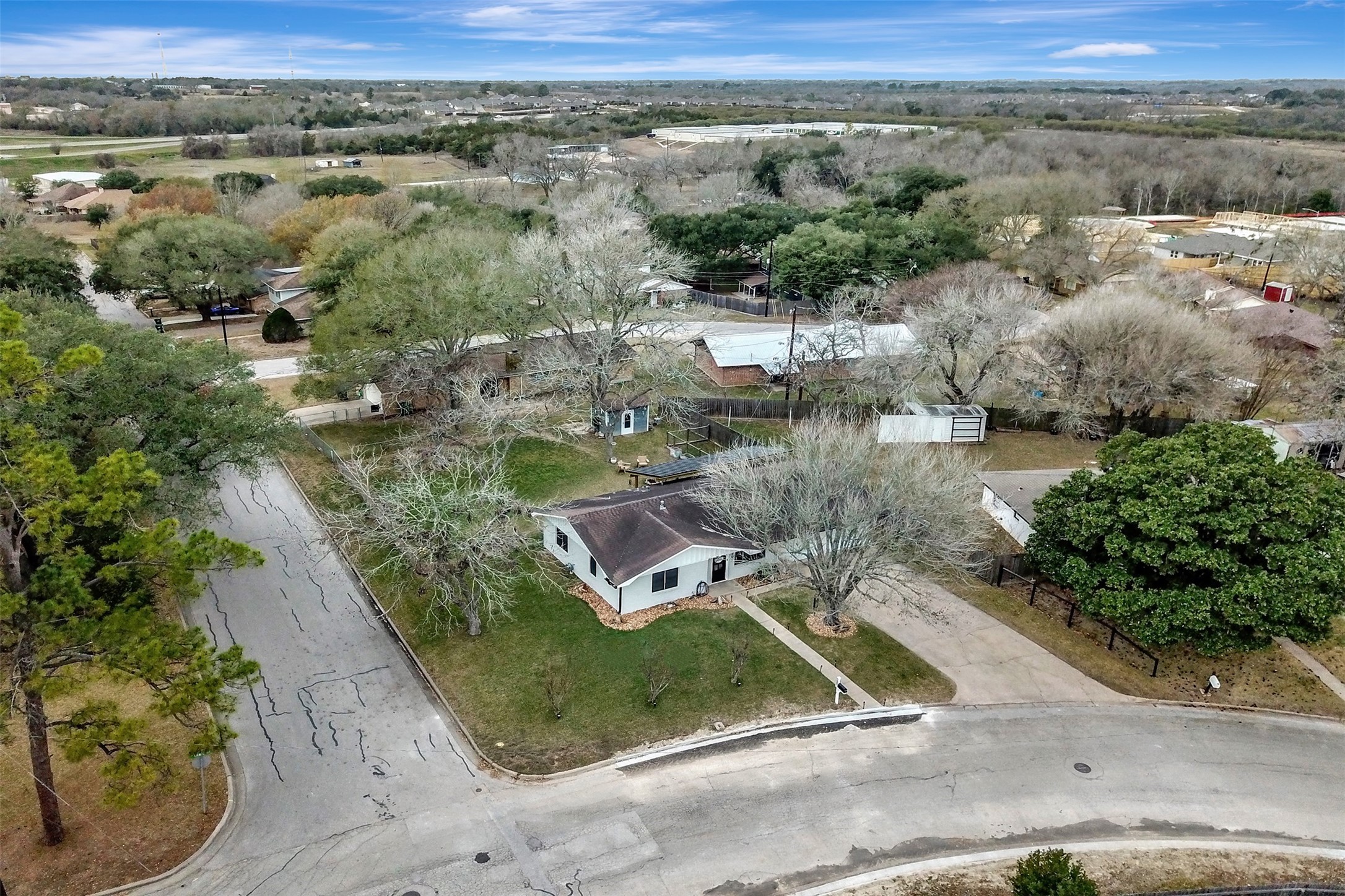 205 Munz Street Brenham, TX 77833 - Photo 42 of 48 an aerial view of a house with a yard