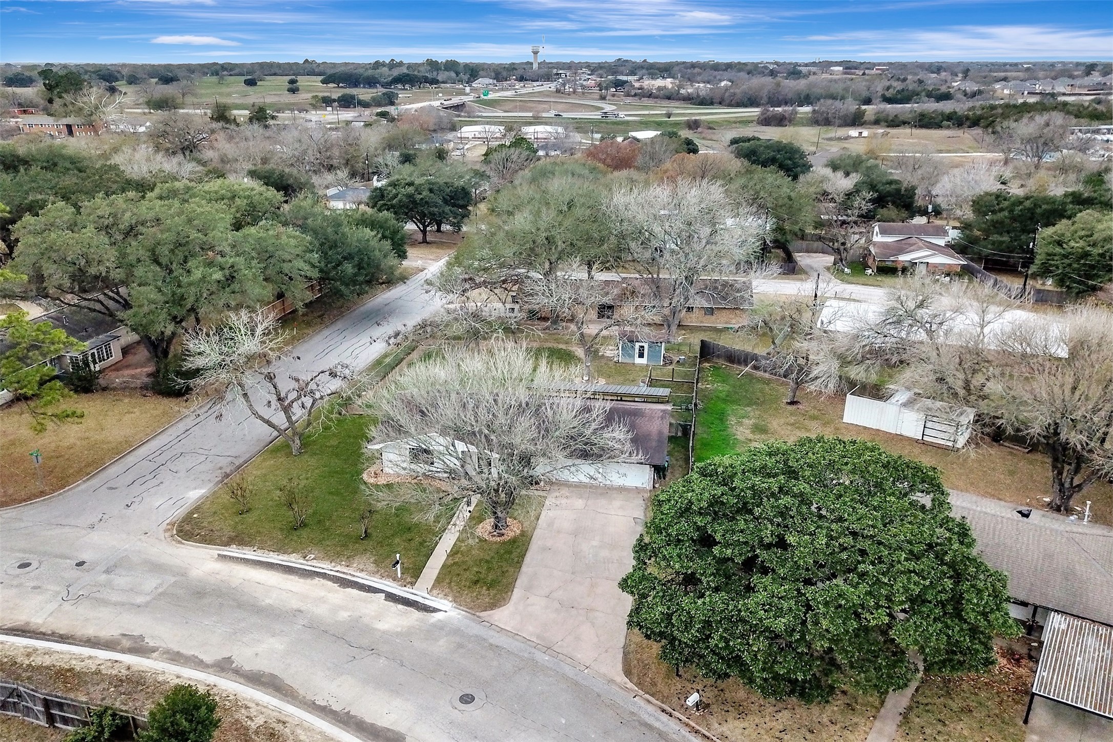205 Munz Street Brenham, TX 77833 - Photo 44 of 48 an aerial view of residential houses with outdoor space
