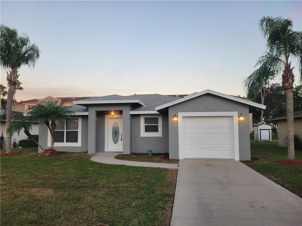 149 Dabou Loop Belle Glade, FL 33430 - Photo 1 of 25 Photo 1