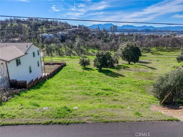 a view of a city with a yard