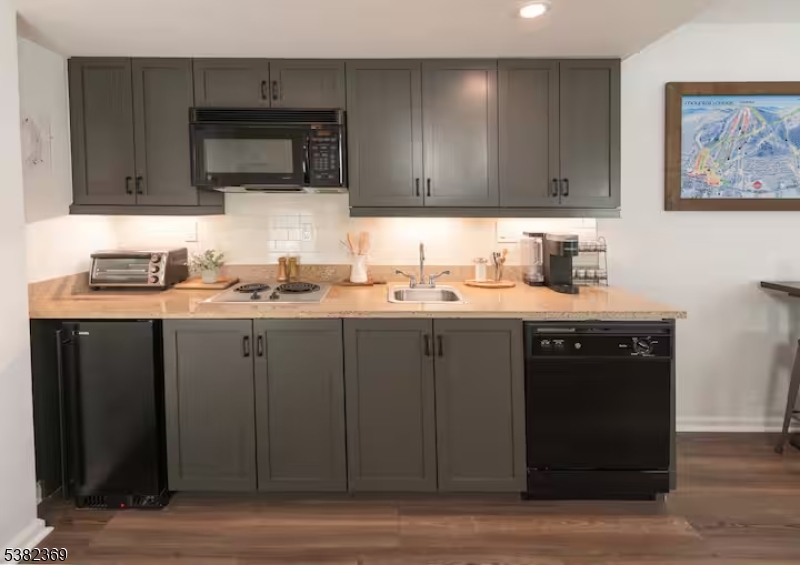 200 Highway 94 Vernon, NJ 07462 - Photo 11 of 25 a kitchen with a sink cabinets and stainless steel appliances