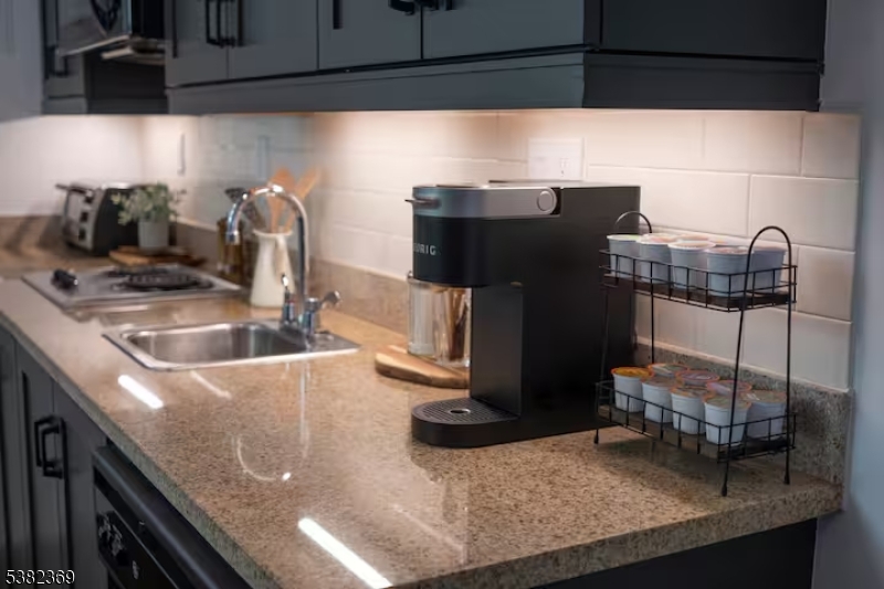 200 Highway 94 Vernon, NJ 07462 - Photo 12 of 25 a kitchen with a sink and cabinets