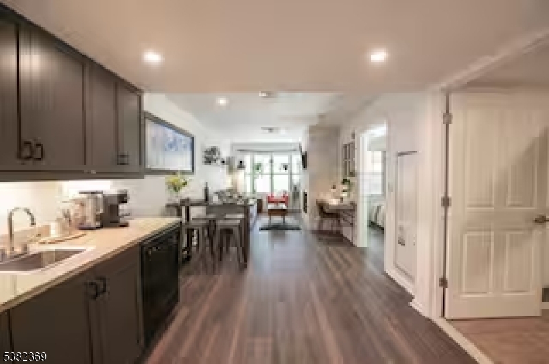 200 Highway 94 Vernon, NJ 07462 - Photo 14 of 25 a kitchen with lots of counter top space and wooden floor