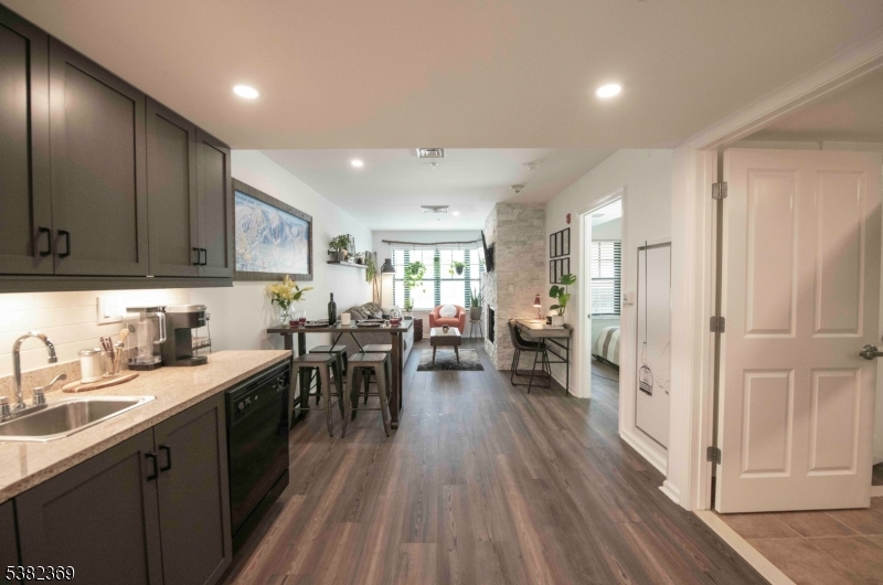 200 Highway 94 Vernon, NJ 07462 - Photo 9 of 25 a kitchen with lots of counter top space and wooden floor