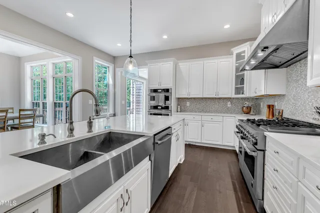 a view of livingroom with hardwood floor and stairs