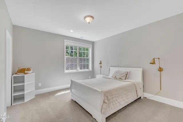 a view of room with window and lounge chair