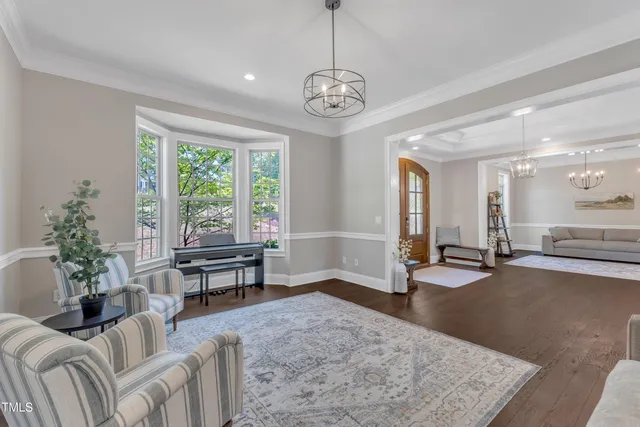 a bedroom with a bed and a mirror