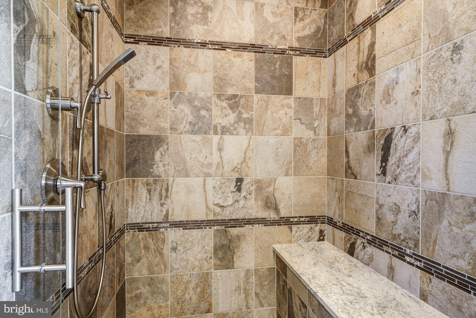 9927 Carter Road Bethesda, MD 20817 - Photo 25 of 47 Outstanding Stone Shower with Bench