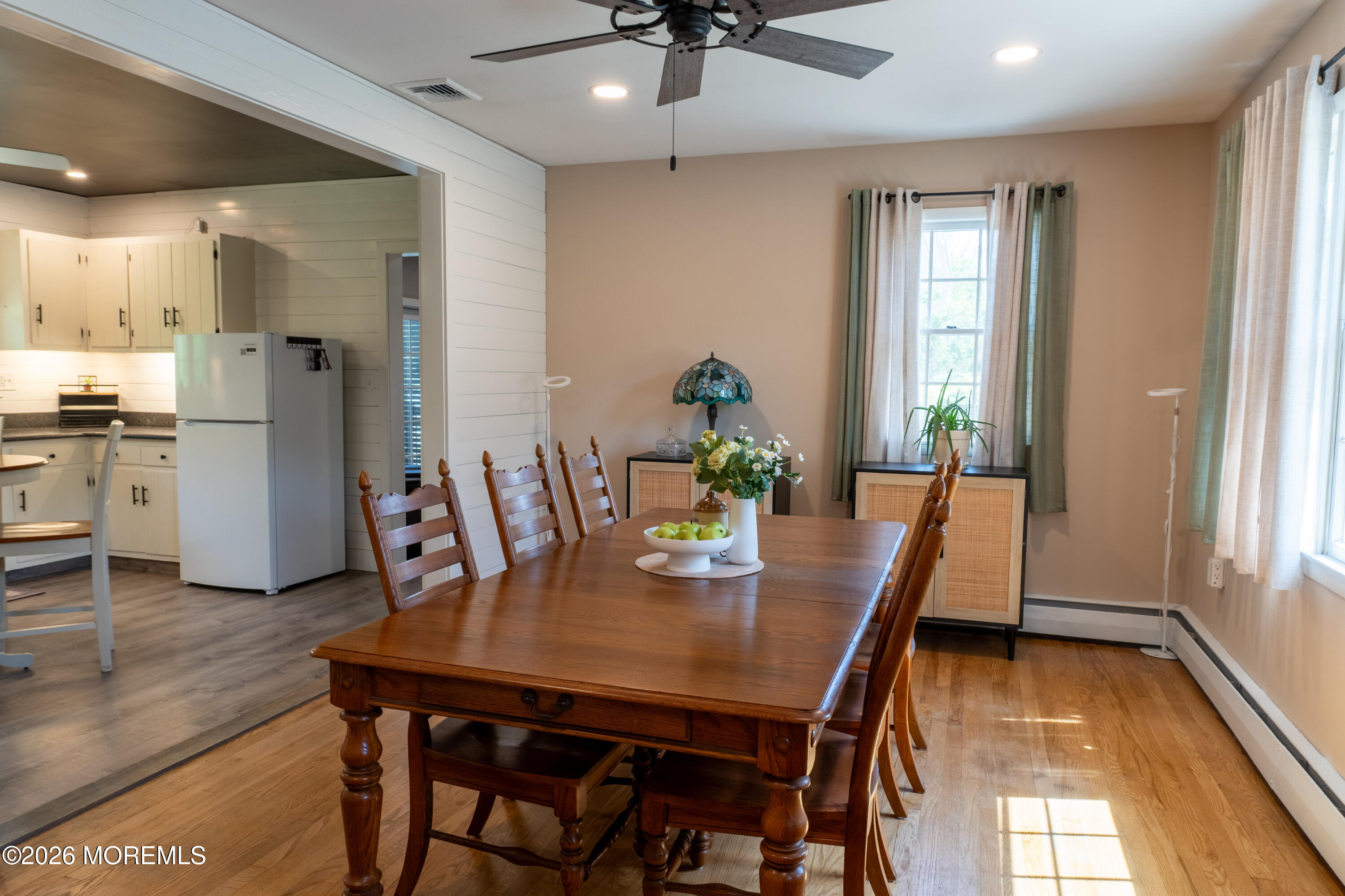 55 Toms River Road Jackson, NJ 08527 - Photo 3 of 31 a view of a dining room with furniture and a chandelier
