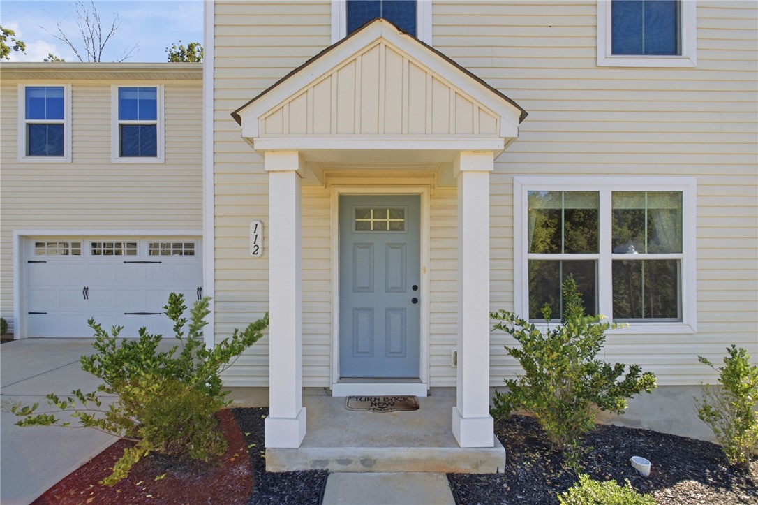 112 Wls Sta Road Seneca, SC 29678 - Photo 5 of 42 A welcoming front porch leads into this beautifully maintained home featuring a private entrance.