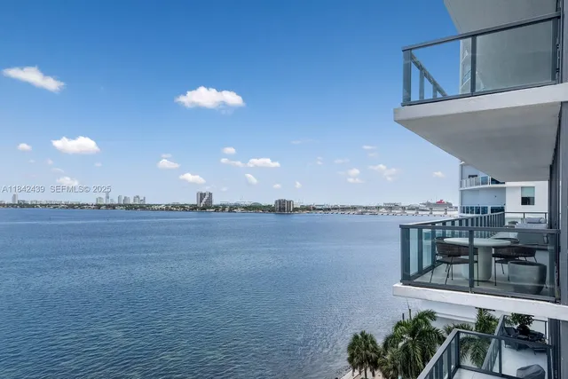 a view of a livingroom with shelves