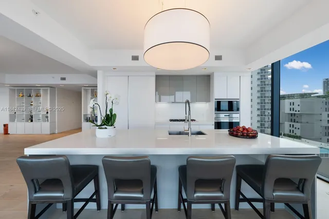 a spacious bathroom with a large tub shower and sink