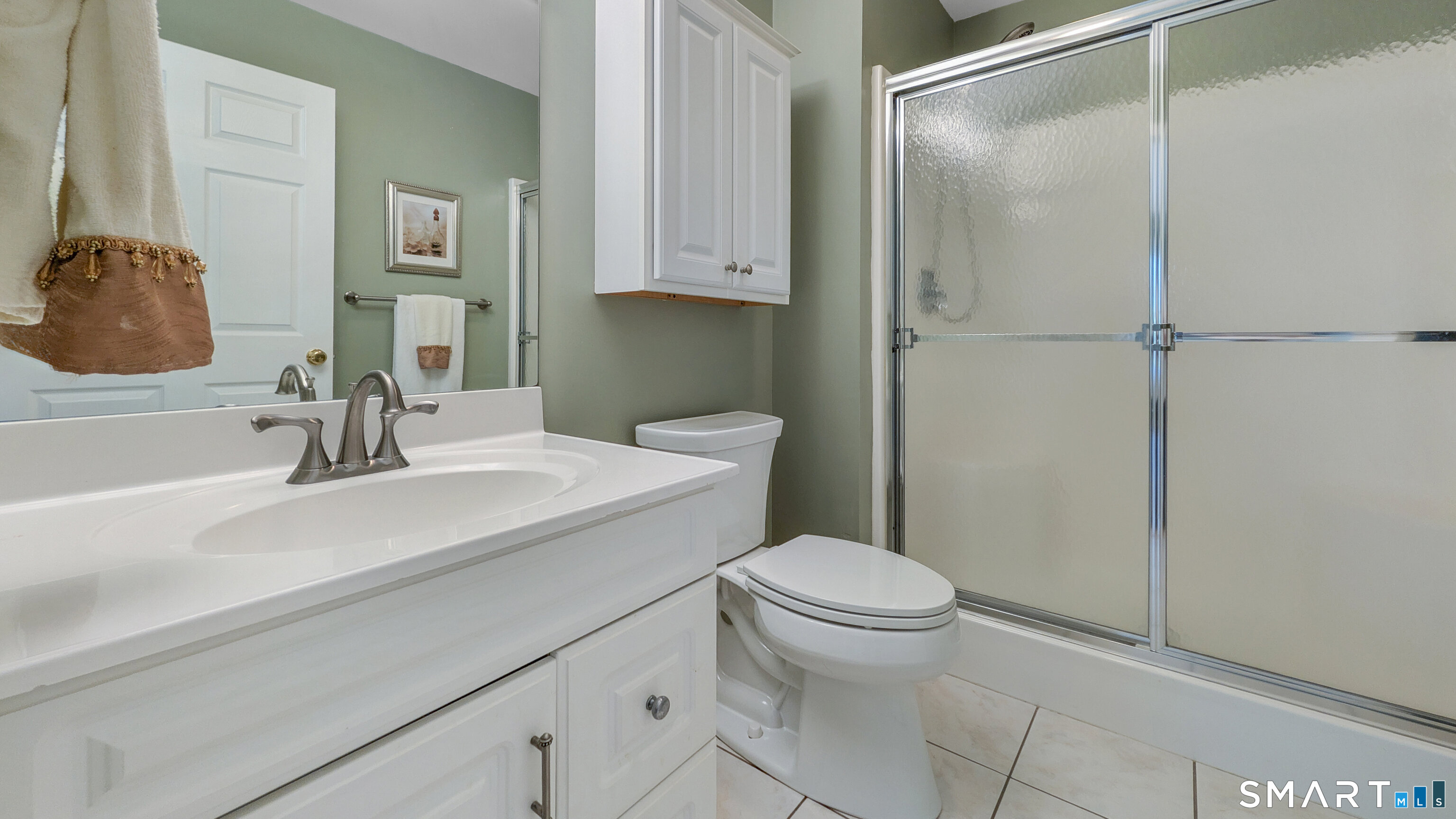 123 Louis Hill Road, Unit 123 Newtown, CT 06482 - Photo 21 of 35 a bathroom with a sink toilet and shower