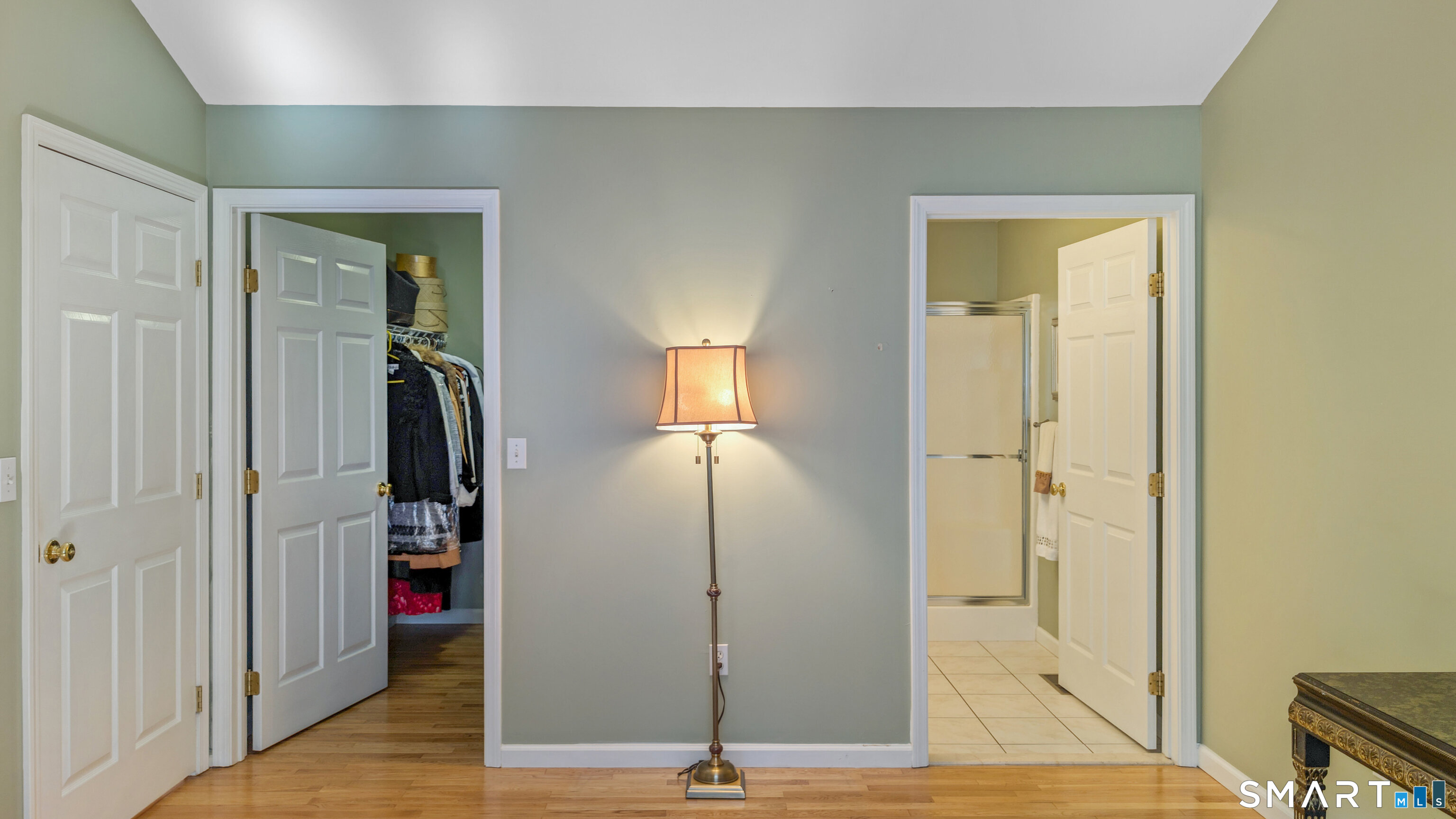 123 Louis Hill Road, Unit 123 Newtown, CT 06482 - Photo 25 of 35 a view of a hallway with wooden floor